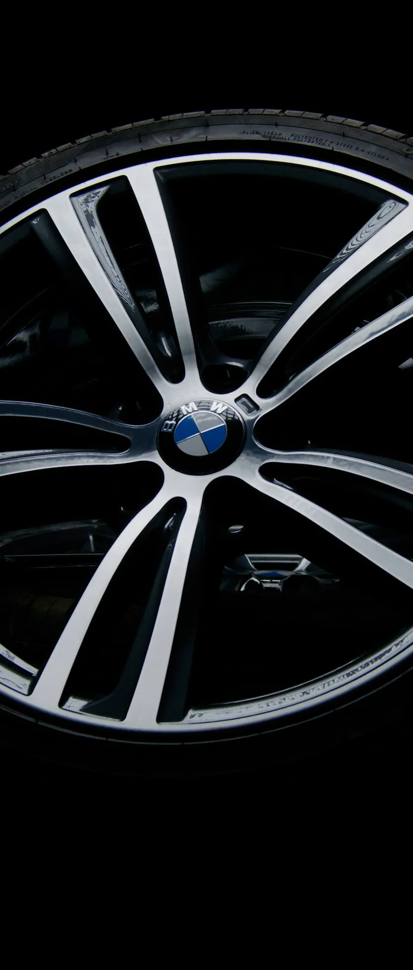 Refurbished BMW alloy wheel in gun metal grey with a diamond cut finish