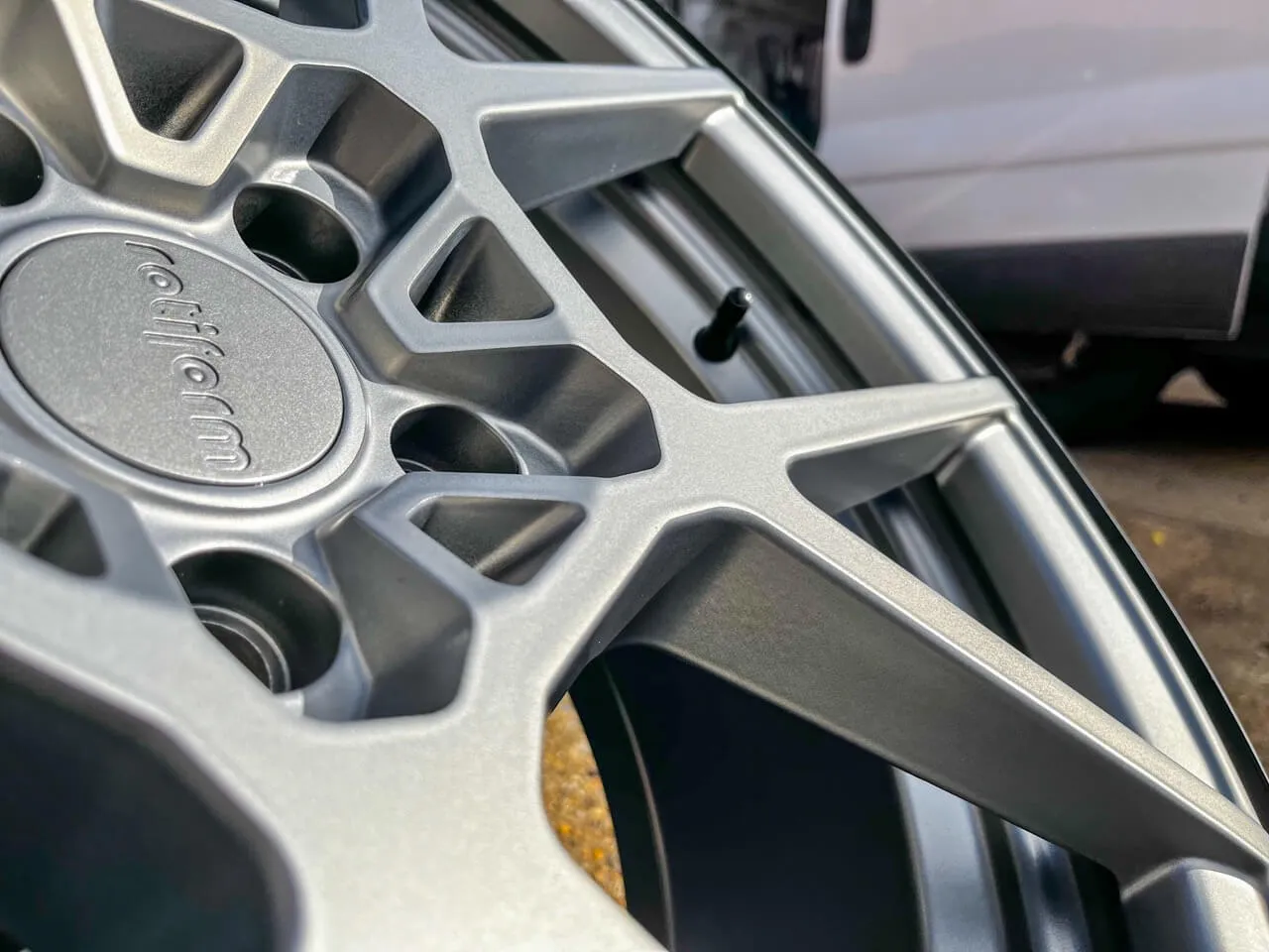 Close up of the ceramic coated Rotiform alloy wheels in grey