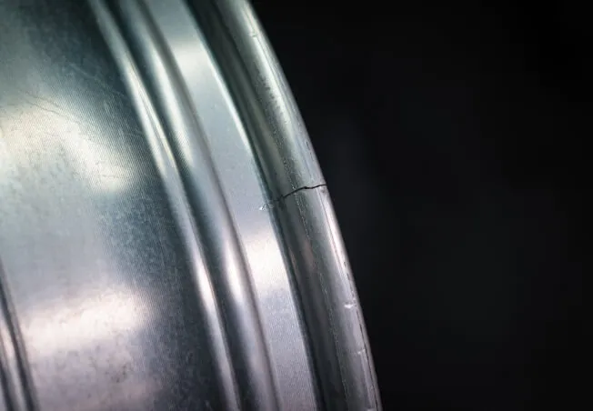 Alloy wheel with a crack to be repaired