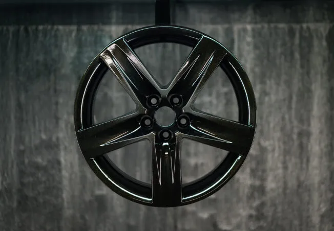 A bespoke finished powder coated alloy wheel with flake