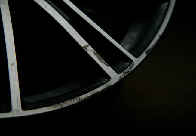 BA damaged diamond cut alloy wheel before refurbishment