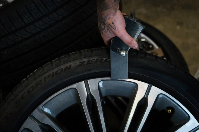 Alloy wheel being colour matched to one of the 150 colour cards Rolling Rims stock