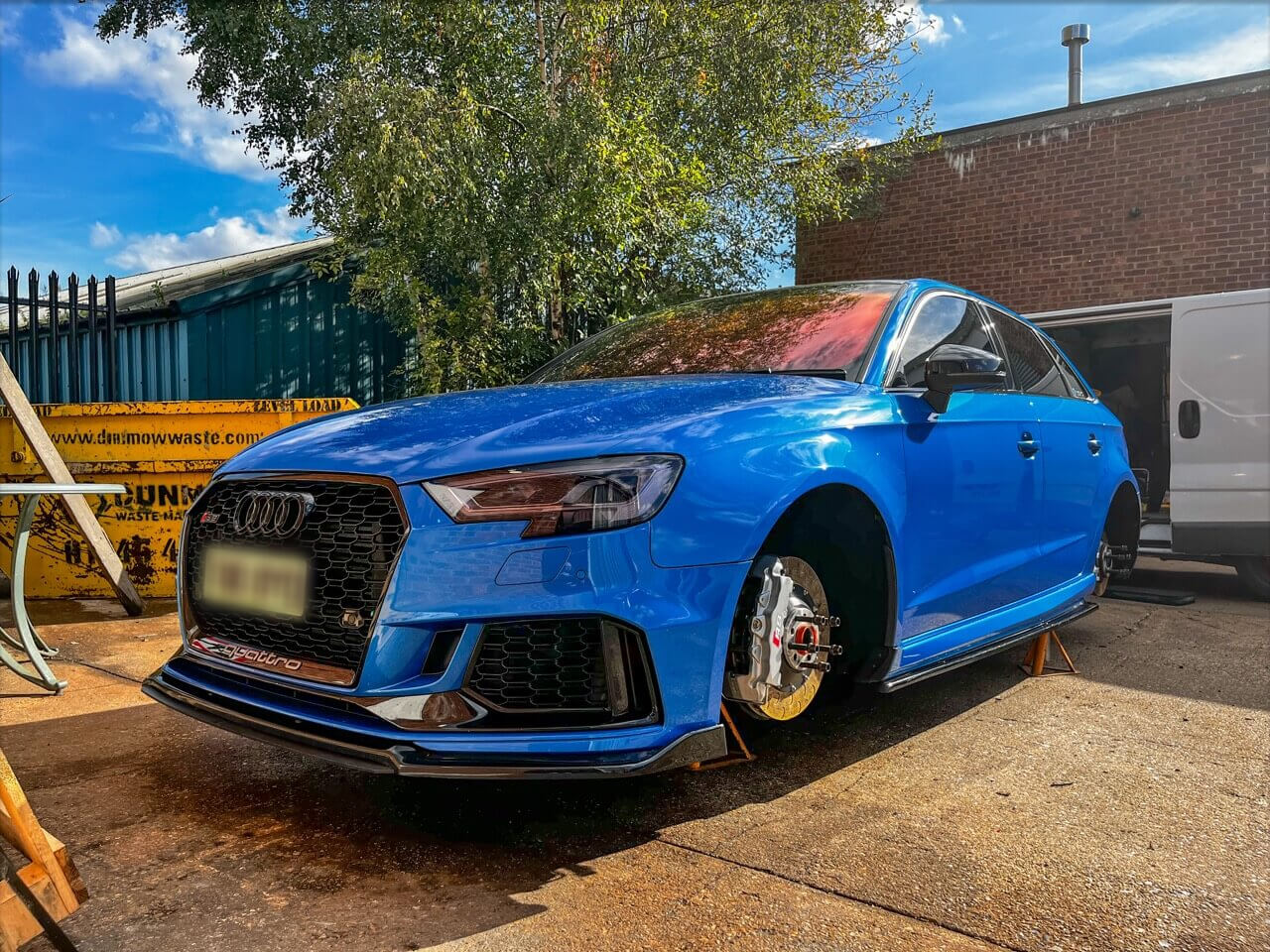 Rolling Rims Audi RS3 on jack stands after having a full detailed wash